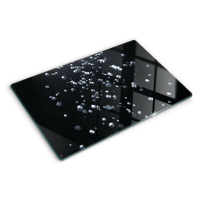 Tocător sticlă Bule de cristal pe fundal negru