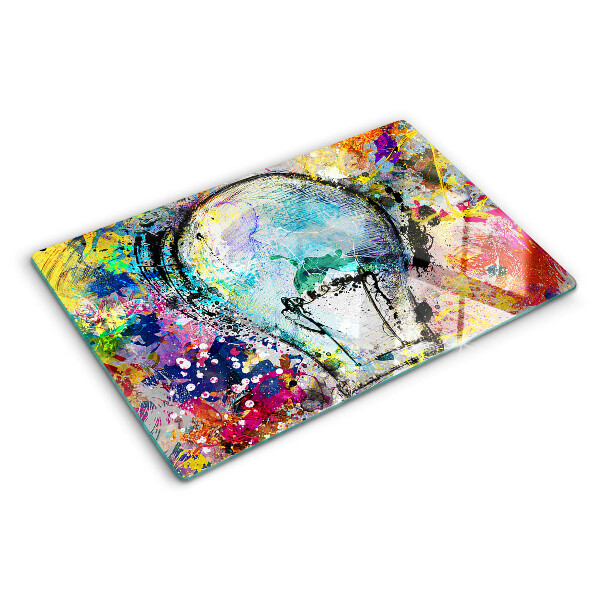 Tocător sticlă Bec pe un fundal colorat