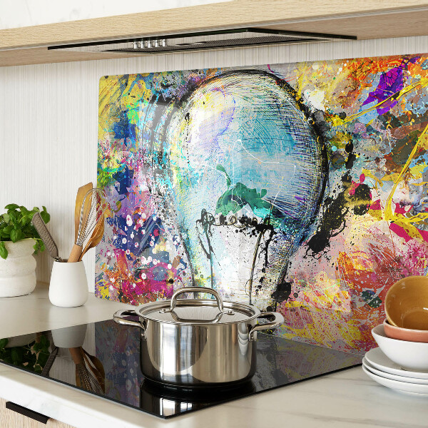 Tocător sticlă Bec pe un fundal colorat