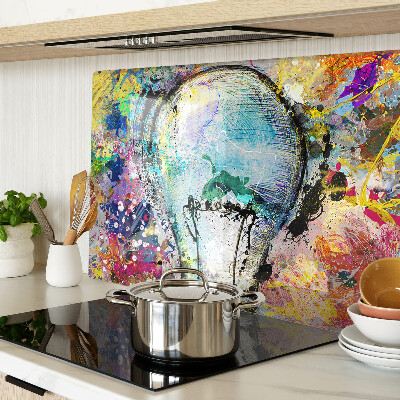 Tocător sticlă Bec pe un fundal colorat