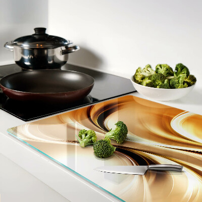 Tocător din sticlă Valuri abstracte în nuanțe de auriu