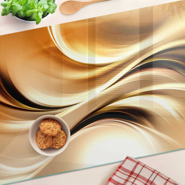 Tocător din sticlă Valuri abstracte în nuanțe de auriu