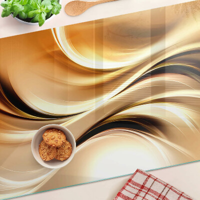 Tocător din sticlă Valuri abstracte în nuanțe de auriu