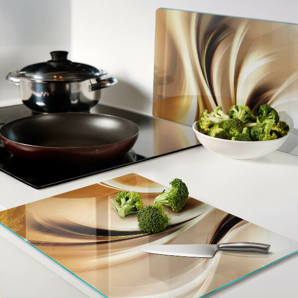 Tocător din sticlă Valuri abstracte în nuanțe de auriu