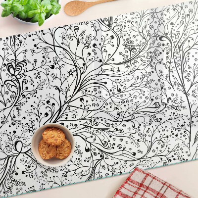 Tocător din sticlă Un model vegetal cu ramuri delicate