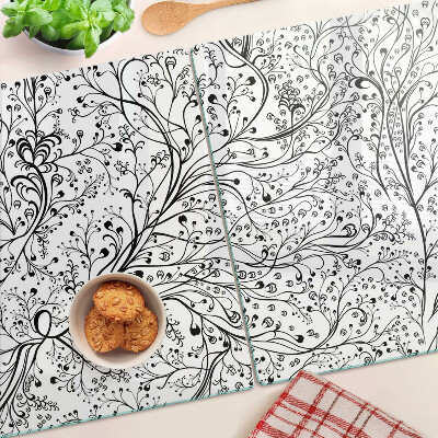 Tocător din sticlă Un model vegetal cu ramuri delicate
