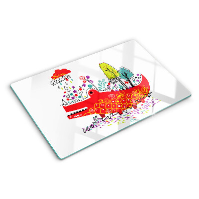 Tocător din sticlă Crocodil într-un decor colorat