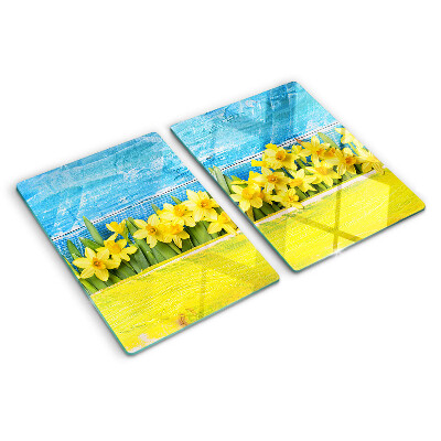 Tocător sticlă Flori de narcisă pe fundalul cerului