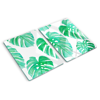 Tocător din sticlă Frunze de Monstera pe fundal alb