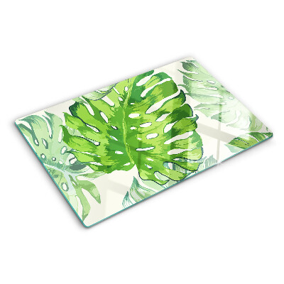 Tocător sticlă Frunze de Monstera pe un fundal deschis