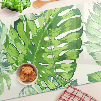 Tocător sticlă Frunze de Monstera pe un fundal deschis