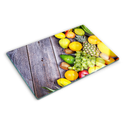 Tocător sticlă Fructe pe un fundal de lemn