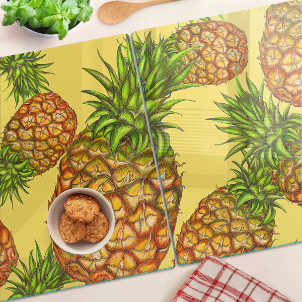 Tocător sticlă Ananas pe un fundal galben