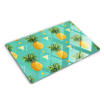 Tocător din sticlă Ananas pe un fundal turcoaz