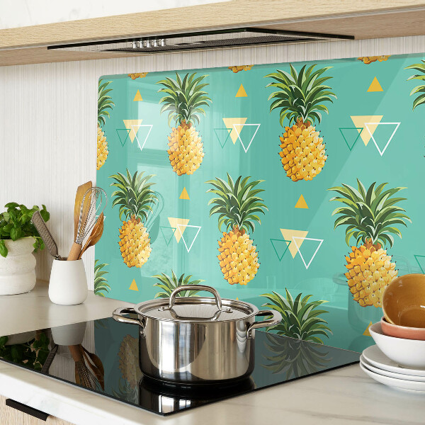 Tocător din sticlă Ananas pe un fundal turcoaz