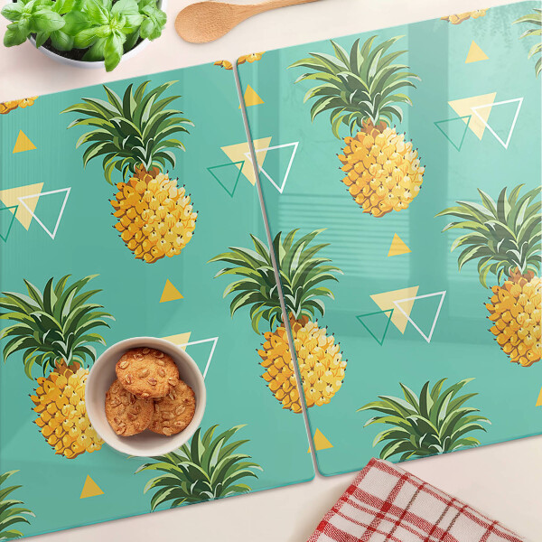 Tocător din sticlă Ananas pe un fundal turcoaz