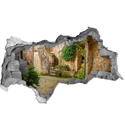 Fototapet 3D gaură în perete O curte fermecătoare în orașul vechi