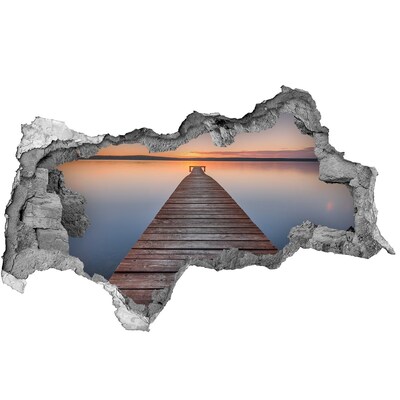 Fototapet un zid spart cu priveliște Apus de soare peste lac