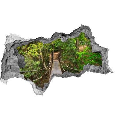 Fototapet 3D gaură în perete Un pod printre verdeață