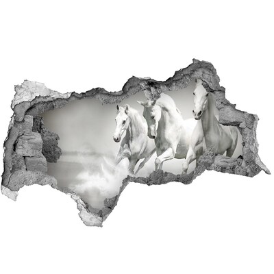 Autocolant un zid spart cu priveliște Cai albi galopând