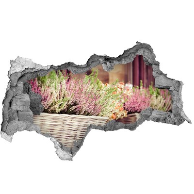 Autocolant un zid spart cu priveliște Un colț de flori în grădină