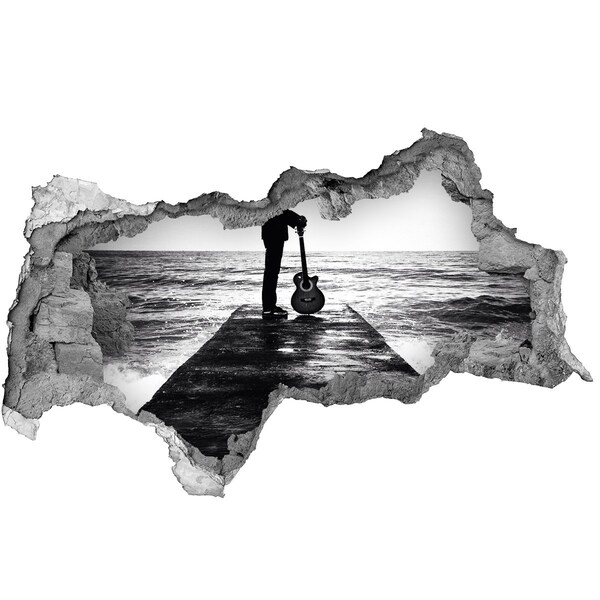 Autocolant un zid spart cu priveliște Muzician pe dig