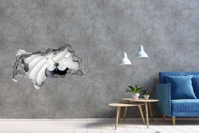 Autocolant gaură 3D Un fluture pe o piatră într-un decor Zen