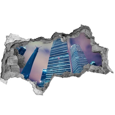 Autocolant un zid spart cu priveliște Oraș modern printr-o gaură în perete