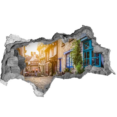 Fototapet 3D gaură în perete O stradă fermecătoare din oraș