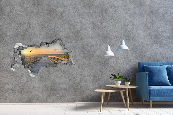 Fototapet un zid spart cu priveliște Apus de soare peste mare