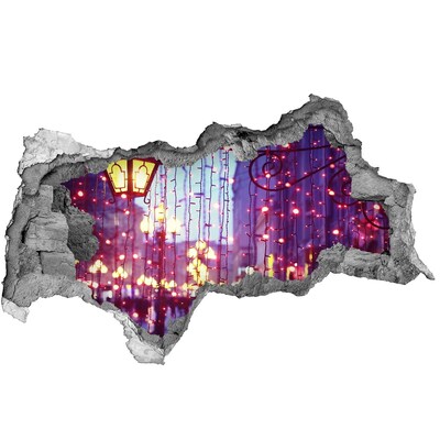 Fototapet un zid spart cu priveliște Lumini de Crăciun în oraș