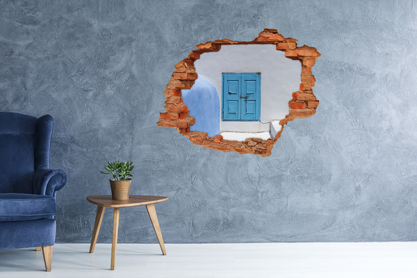 Autocolant un zid spart cu priveliște Un perete spart cu o ușă albastră