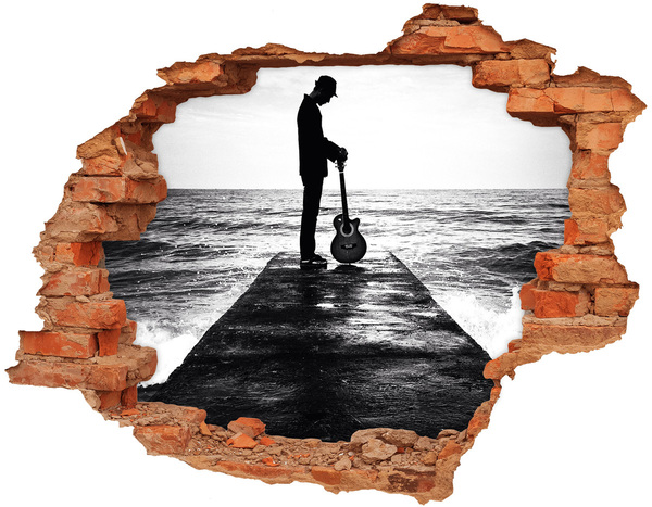 Fototapet un zid spart cu priveliște Muzician pe dig