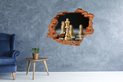 Autocolant un zid spart cu priveliște Jucând șah printr-o gaură în perete