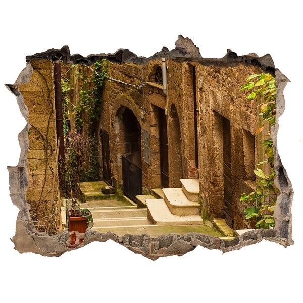 Fototapet un zid spart cu priveliște O stradă fermecătoare din oraș