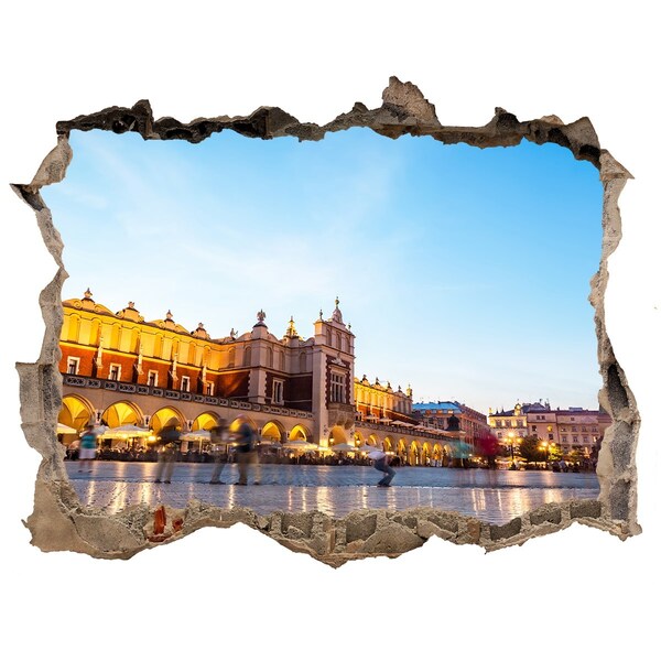 Autocolant un zid spart cu priveliște Cracovia la apus