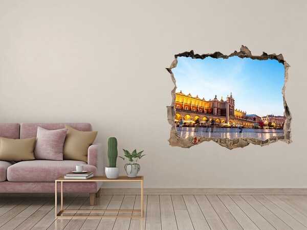 Autocolant un zid spart cu priveliște Cracovia la apus