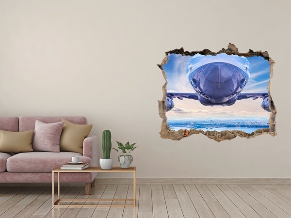 Autocolant 3D gaura cu priveliște Un avion deasupra orașului