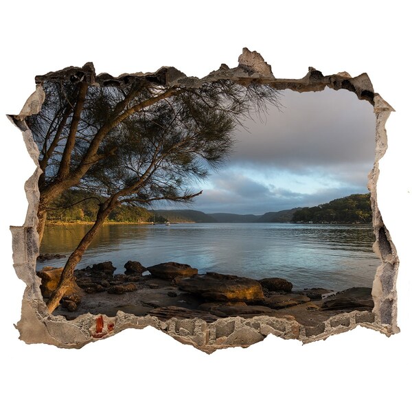 Fototapet un zid spart cu priveliște Pace lângă apă