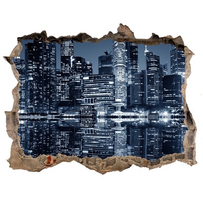 Fototapet un zid spart cu priveliște Oraș noaptea lângă râu