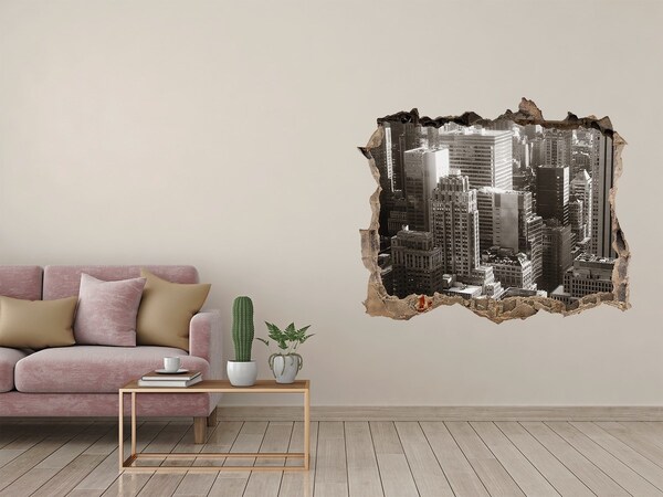 Fototapet un zid spart cu priveliște Vedere a orașului dintr-o gaură în zid