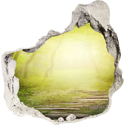 Fototapet un zid spart cu priveliște Pădurea verde în razele soarelui