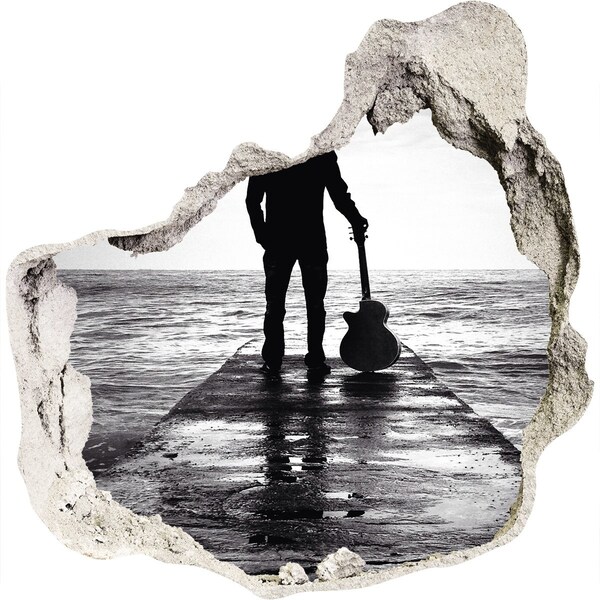 Fototapet un zid spart cu priveliște Muzician pe dig