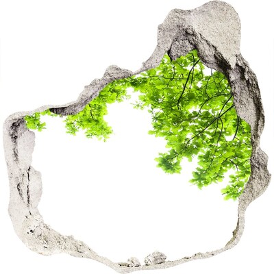 Autocolant un zid spart cu priveliște O oază verde în spatele zidului