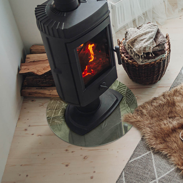 Placă rotundă din sticlă pentru șemineu Frunze tropicale pe fundal