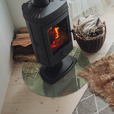 Placă rotundă din sticlă pentru șemineu Frunze tropicale pe fundal