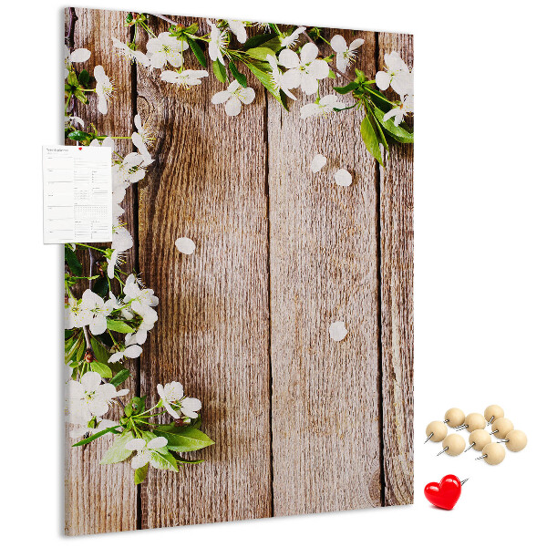 Tabla de pluta Flori pe un fundal de scânduri de lemn