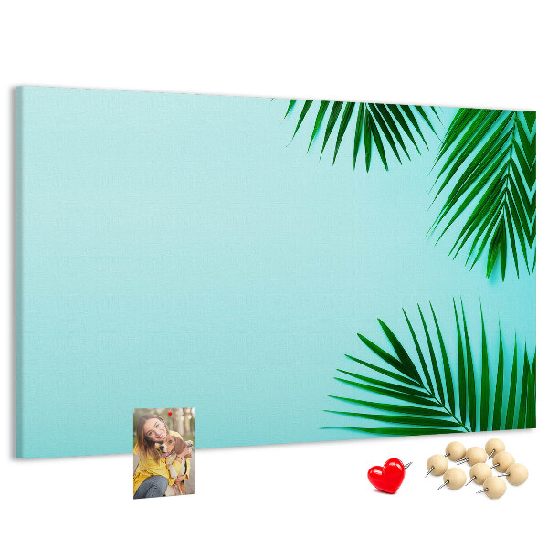 Panou de pluta Frunze tropicale pe fundal albastru