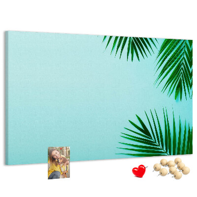 Panou de pluta Frunze tropicale pe fundal albastru