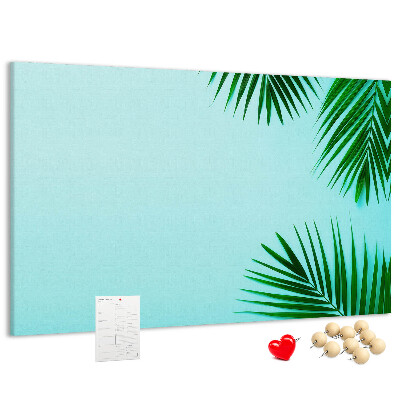 Panou de pluta Frunze tropicale pe fundal albastru